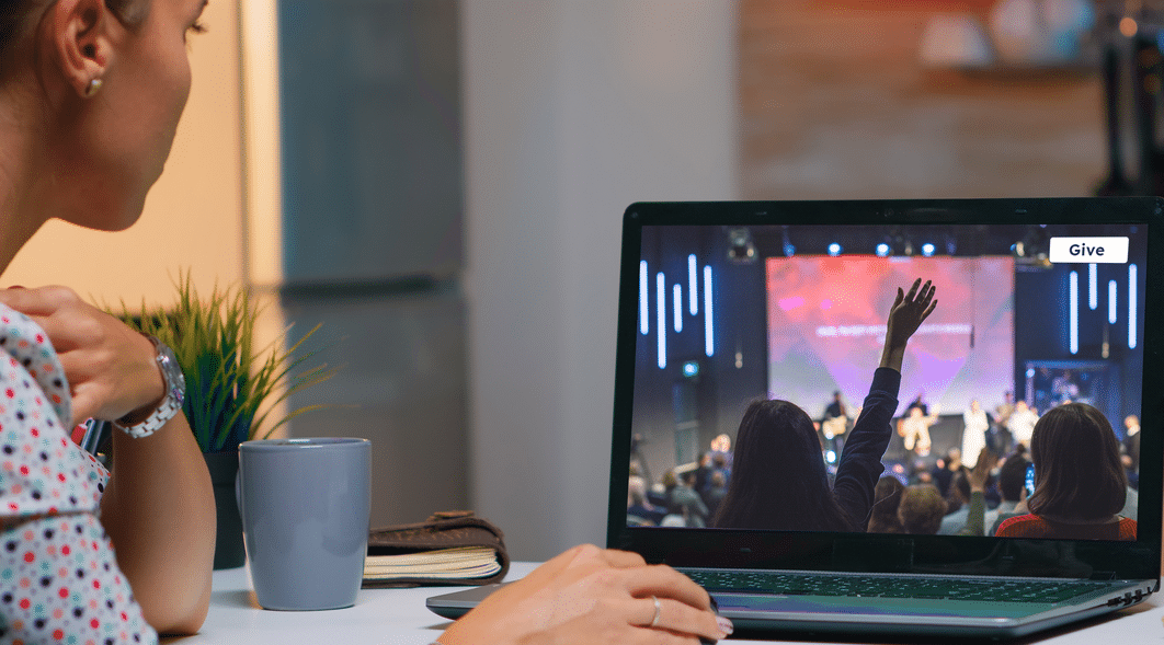 Woman in her home watching church livestream