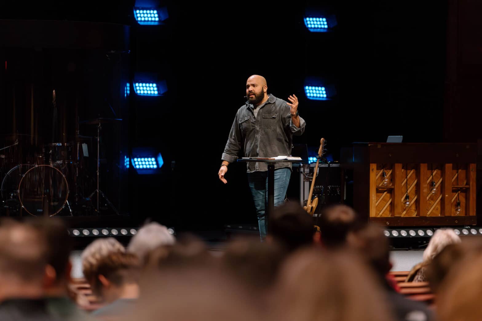 pastor Erick Gil preaching to the congregation of Maranatha Bible Church in Akron, Ohio.