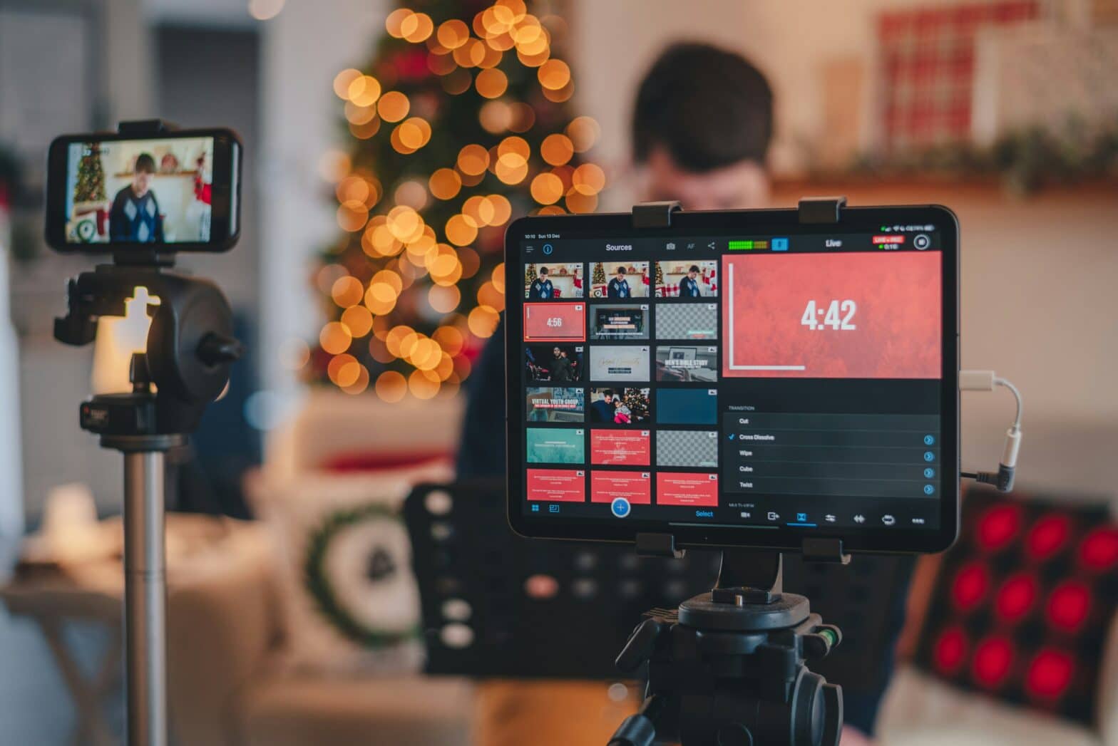 person standing in front of camera to be live streamed