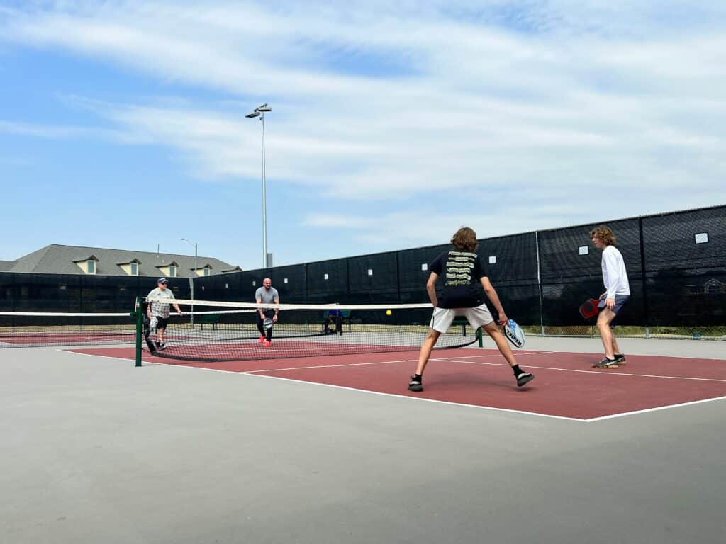 people playing pickleball on a live stream